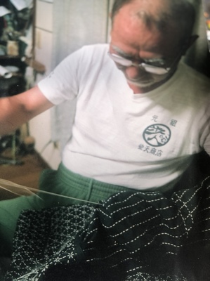 父・憲次